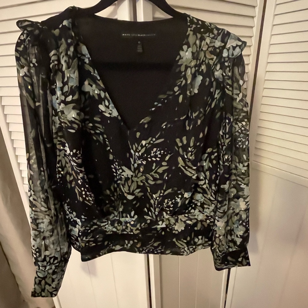 Elegant blouse from WHBM. Sheer sleeves with shimmer throughout.